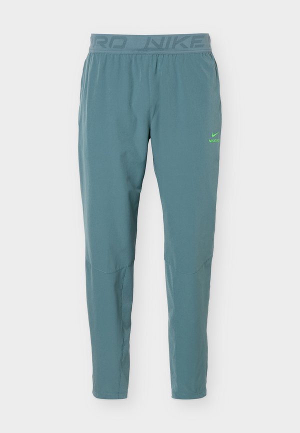 Nike Performance M NP DF NPT PANT - Tracksuit bottoms - mineral slate/green strike