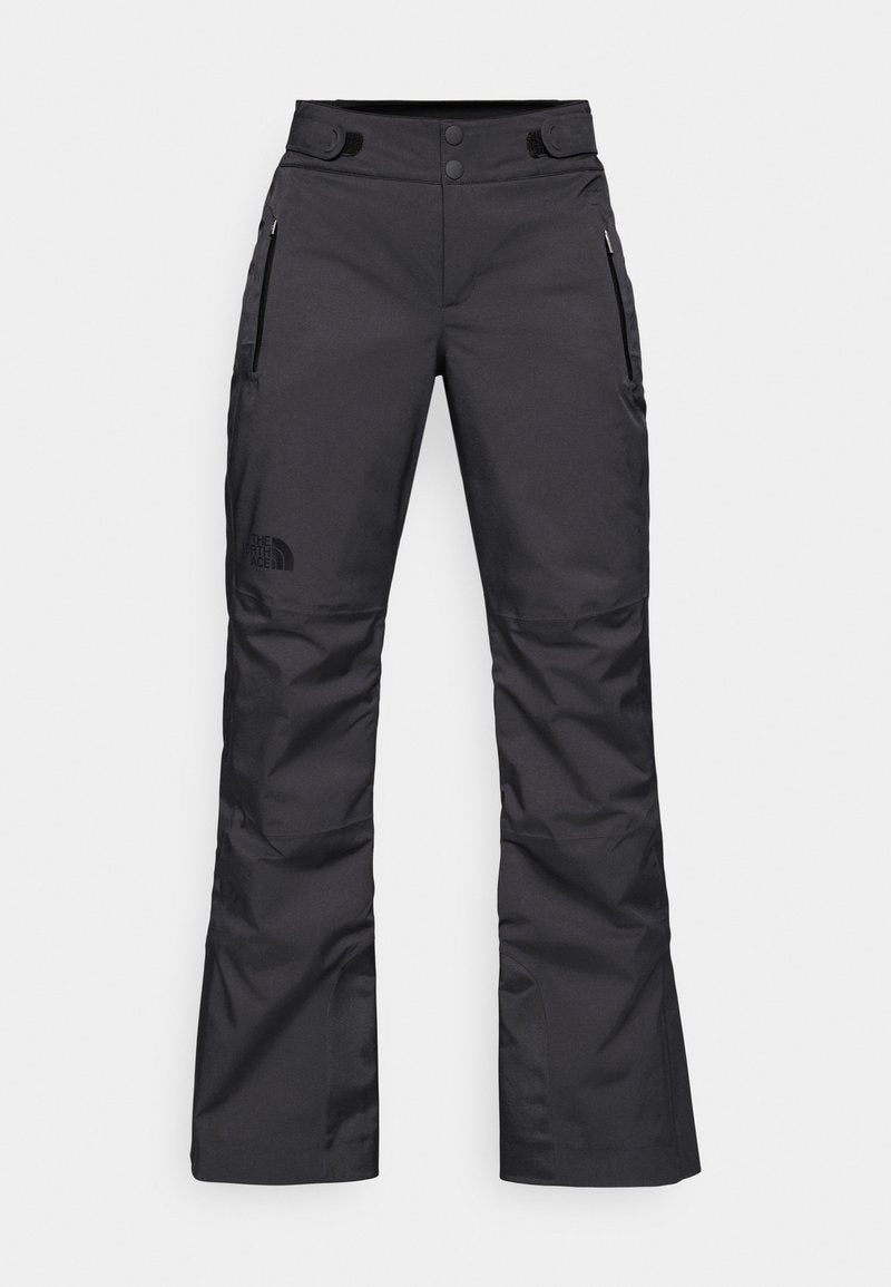 Schwarze Skihosen mit geradem Schnitt, aus strapazierfähigem Material, ausgestattet mit zwei seitlichen Reißverschlusstaschen und dem Logo von The North Face am linken Bein.