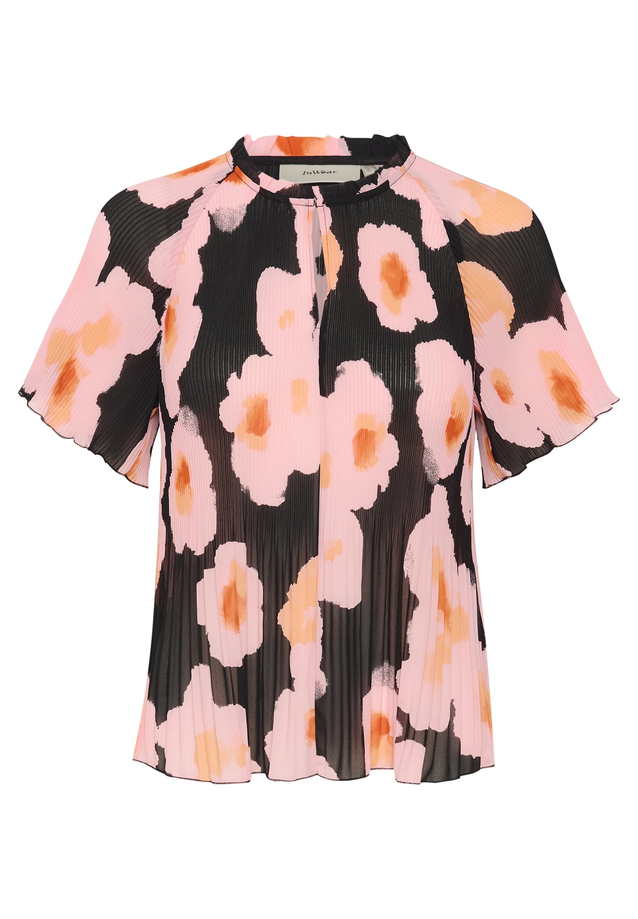 Blumenbluse mit gefältetem Design in Pink- und Schwarztönen, runder Halsabschluss und kurzen Ärmeln. Akzente setzen hellorange Blumen.