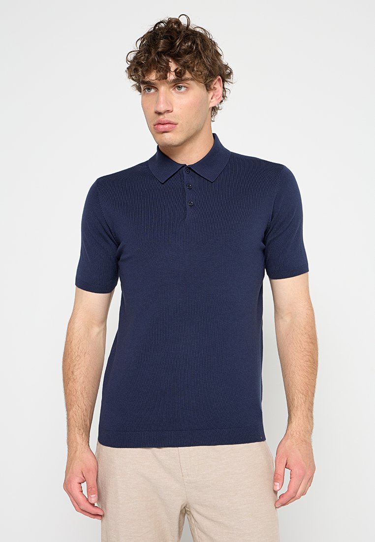 NO EXCESS Poloshirt Media 1