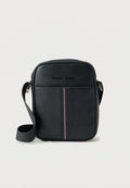 Tommy Hilfiger PEBBLE GRAIN CROSSBODY REPORTER BAG - Cross body bag - black