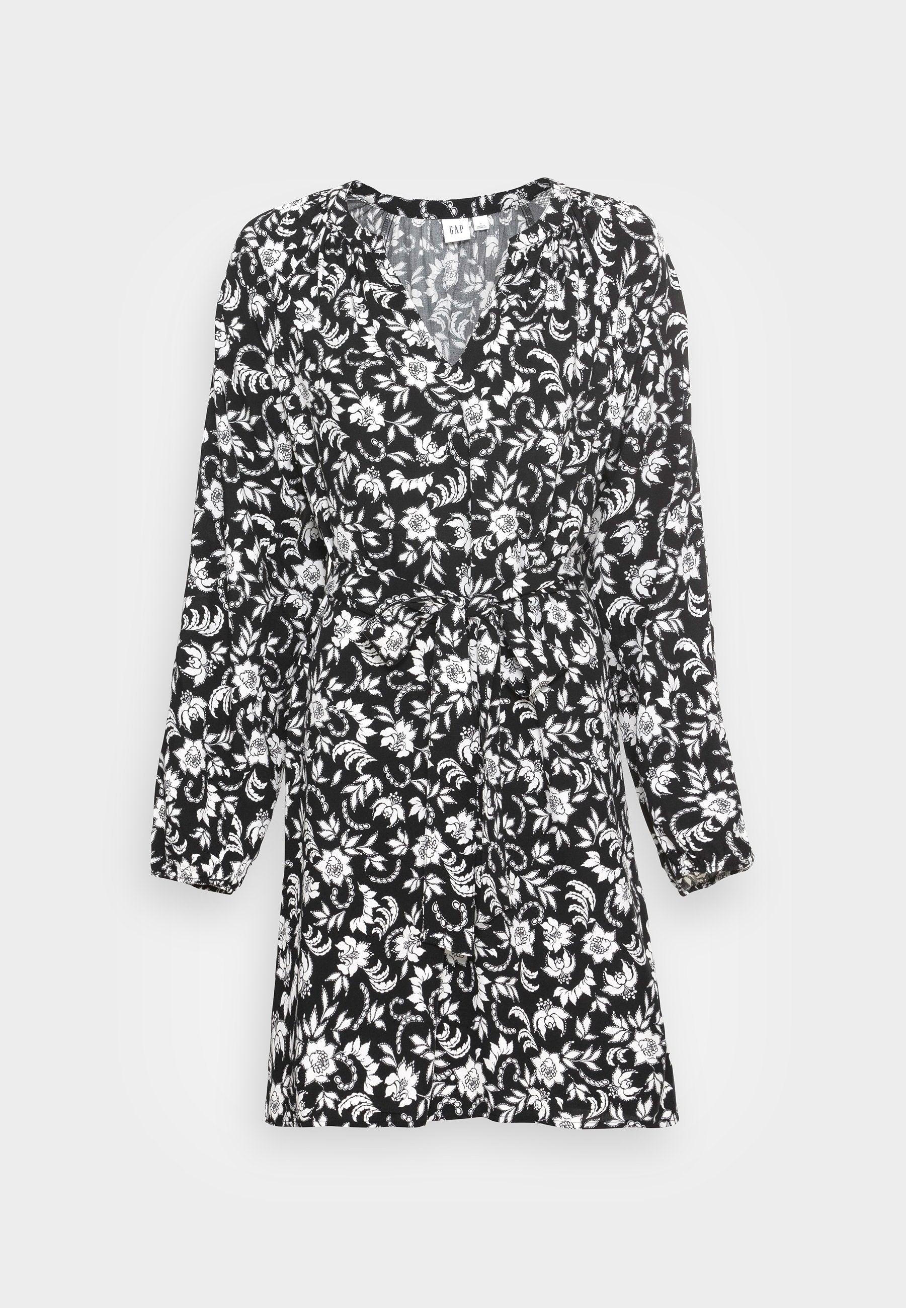 Schwarz-weißes Blumenkleid mit langen Ärmeln, V-Ausschnitt, Wickeldesign, geraffter Taille und einem strukturierten Stoff mit einem Blatt- und Blumenmuster.