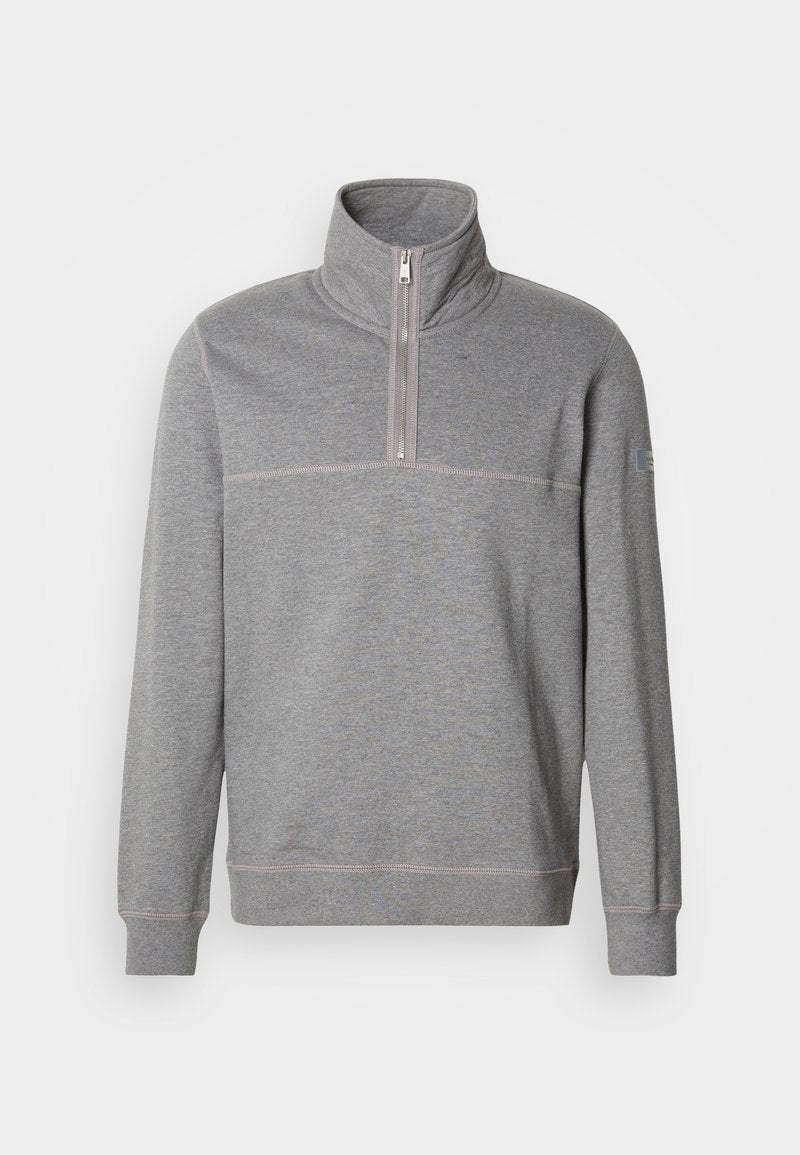 Grauer Zip-Hoodie mit hohem Kragen, weichem Material und kontrastierenden Nähten. Verfügt über eine Brustnaht und ein Logo auf dem Ärmel.