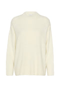 Cremfarbener Pullover aus weichem, flauschigem Material. Verfügbar mit rundem Hals, langen Ärmeln und gerippten Bündchen sowie Saum für zusätzliche Struktur.