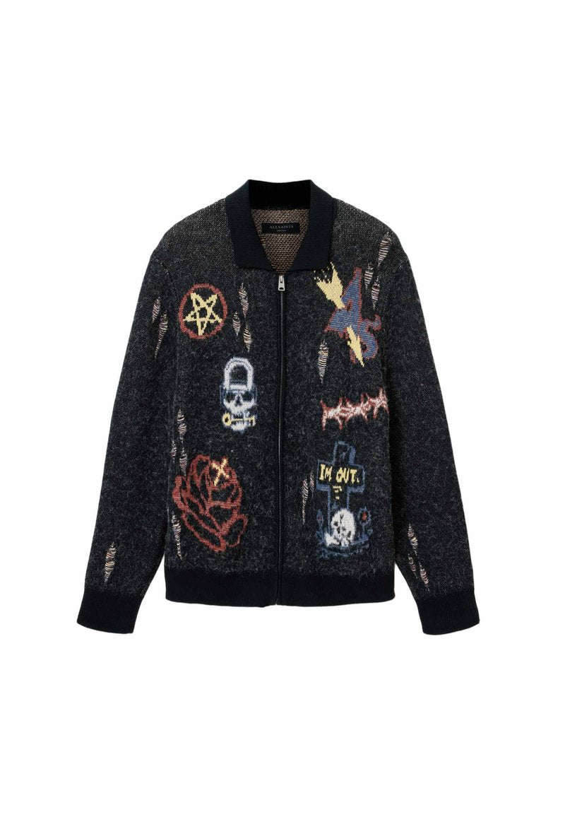 Schwarzer Zip-up-Cardigan mit distressed Details und bunten Aufnähern, darunter ein Pentagramm, Totenschädel, Rose, Blitz und ein Grab mit dem Text "I'M OUT."
