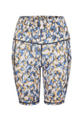 Mehrfarbige gemusterte Shorts mit elastischem Bund. Das Design zeigt Blau, Gelb und Weiß in einem leopardähnlichen Muster. Strukturierter Stoff.
