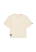 Beige Baumwoll-T-Shirt mit kurzen Ärmeln, rundem Halsausschnitt und einem strukturierten Grafiketikett unten links mit dem Text "LEFT."