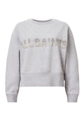 Grauer, kurz geschnittener Sweatshirt mit langen Ärmeln. Verziert mit dem Schriftzug "ALLSAINTS" aus silbernen Strasssteinen auf der Vorderseite. Weiches Material mit strukturiertem Finish.