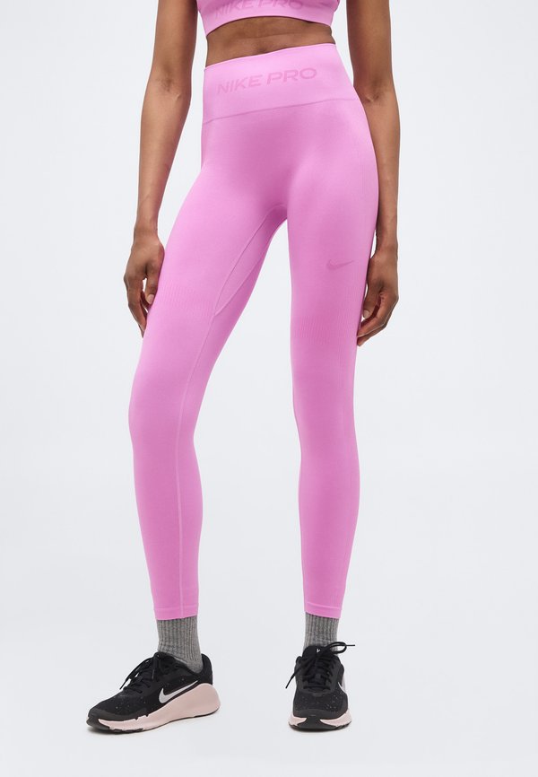 Nike Performance TIGHT - Leggings - light magenta