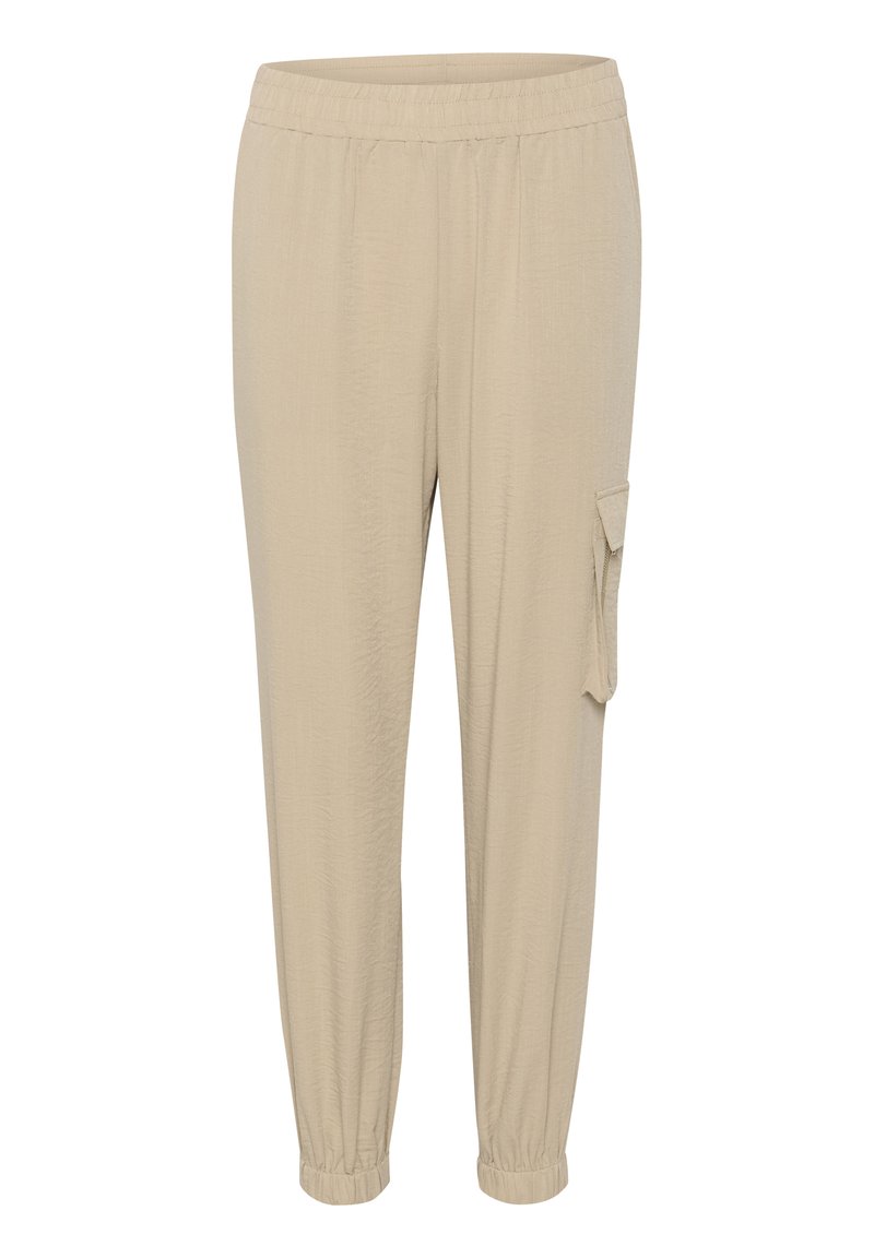 Beige weite Hosen mit elastischem Bund, umgeschlagenen Knöcheln und einer seitlichen Cargo-Tasche. Hergestellt aus leichtem, strukturiertem Stoff.