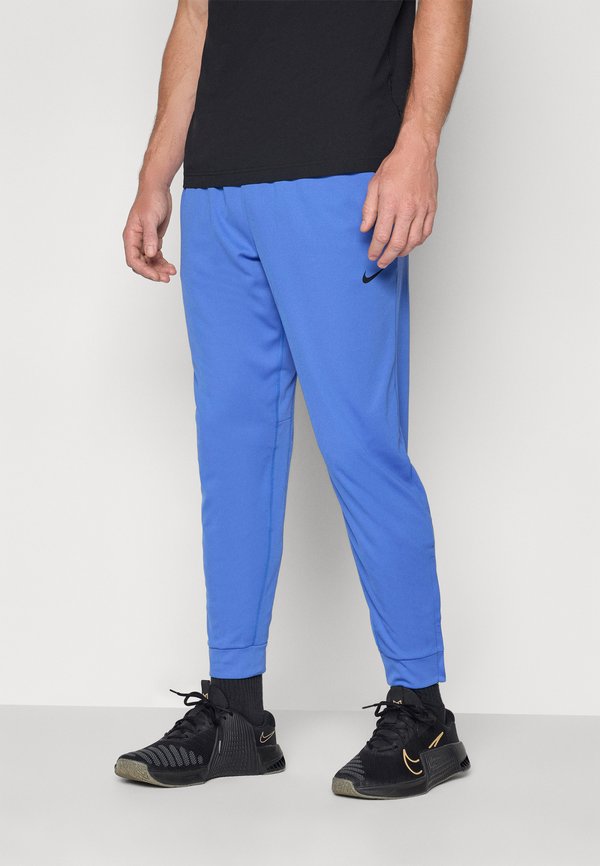 Nike Performance TOTALITY - Tracksuit bottoms - comet blue/black