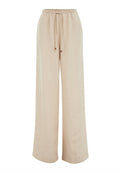 Beige, weite Hosen aus weichem Stoff. Sie verfügen über ein elastisches Bündchen mit Kordelzug und kleinen metallischen Akzenten.