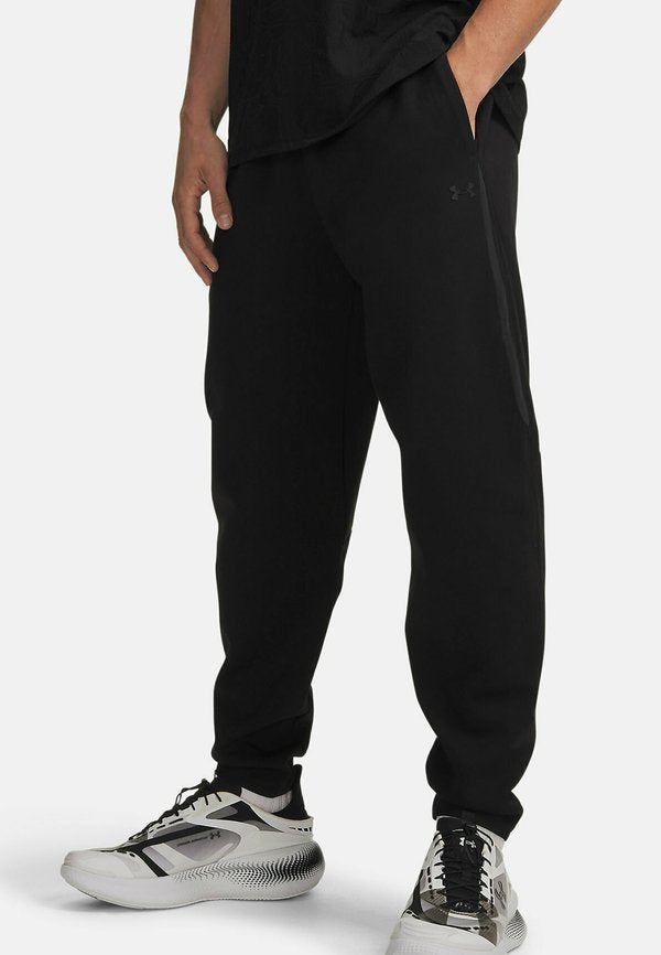 Under Armour UNSTOPPABLE FLEECE - Tracksuit bottoms - ultimate black