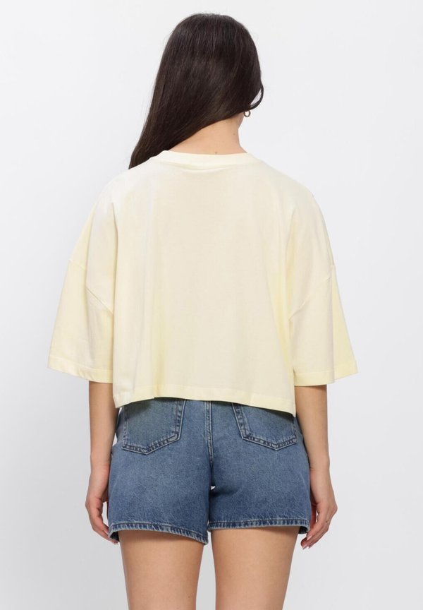 Calvin Klein CALVIN KLEIN DAMES TOPS SS CROPPED BOXY HERITAGE CREST.