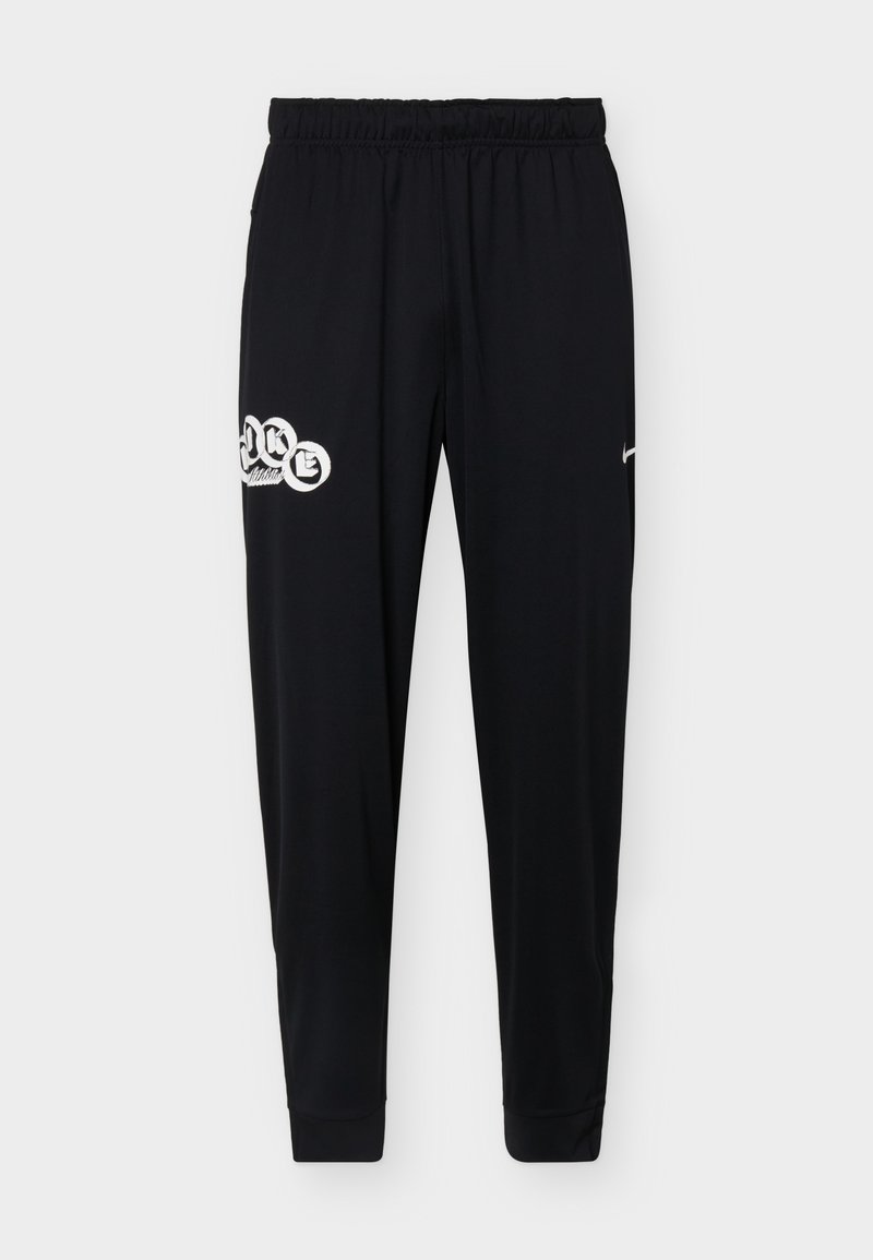 Schwarze sportliche Jogginghosen mit elastischem Bund, Bündchen an den Knöcheln, weißem Aufdruck am linken Oberschenkel und kleinem weißem Nike-Swoosh am rechten Bein.