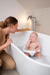 Badesitz TILO grün/weiß rotho babydesign